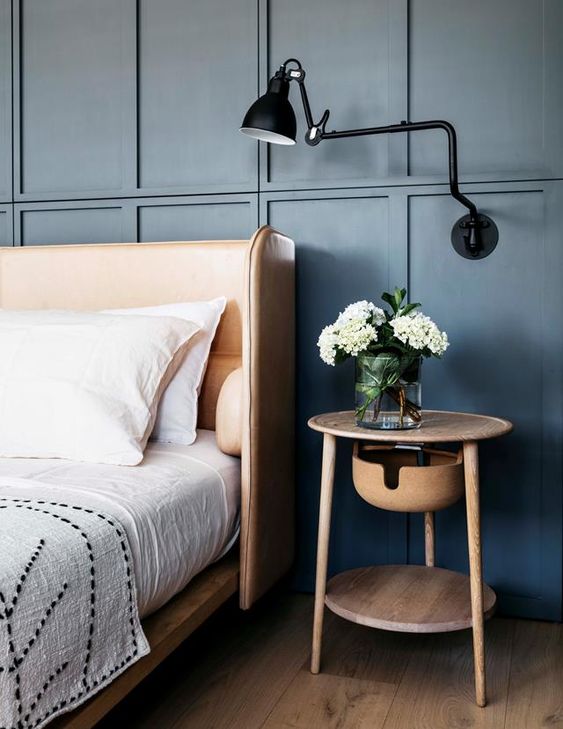 a sleek amber leather wingback headboard is a chic idea that adds coziness to the bedroom