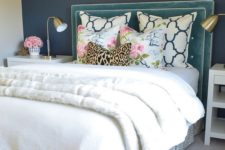 23 a teal headboard with framing and decorative nails is a touch of color for your glam bedroom