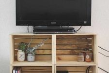 25 a TV unit made of crates is a simple and stylish idea with plenty of storage that can be made very fast and easily