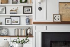 25 a neutral and simple wall lamp in the living room is what you need for some additional light
