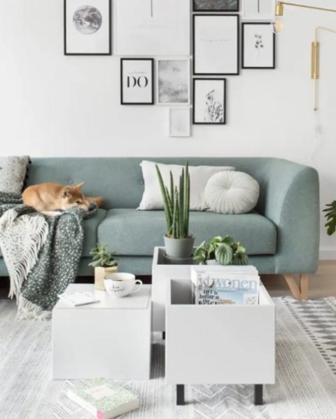 IKEA Eket cabinets placed on legs and with an added top as a trio of coffee tables