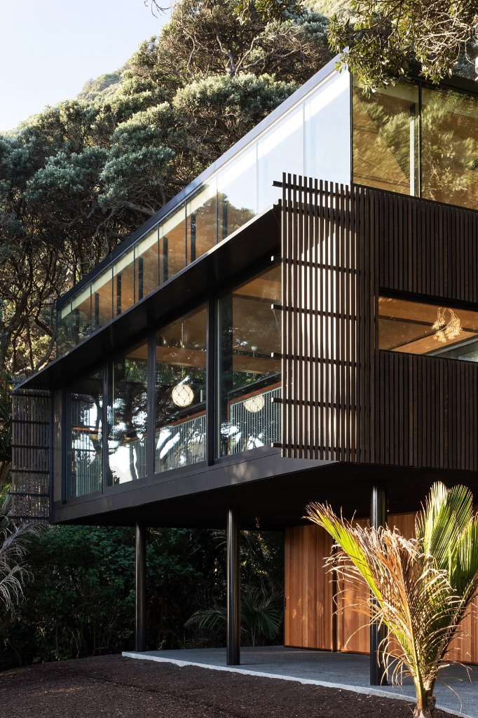 This gorgeous home is raised on stilts to enjoy the views and it can be totally opened to the outdoor spaces
