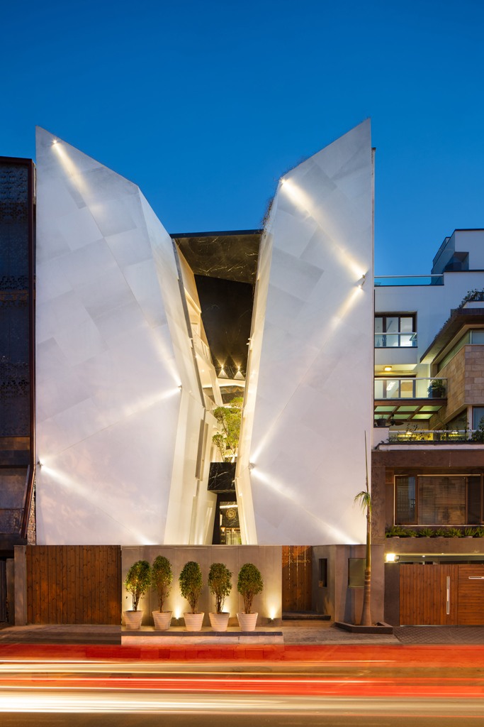 This unique home is called Cleft House and is split in two by an atrium to make it private yet get enough light