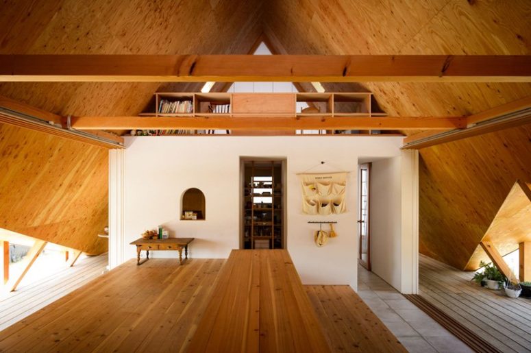 The interiors are minimalist, done with light stained wood and plywood and some sleek white surfaces The interiors are minimalist, done with light stained wood and plywood and some sleek white surfaces