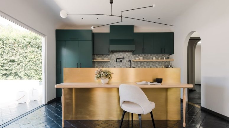 There's also a metal wall that hides the bar and separates the space from the desk