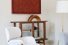 04 Every nook of the apartment is characterized by stylish designer furniture, elegant artworks and catchy and bold designs