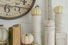 04 take rustic candleholders and use them pumpkins stands for the fall, it’s a very creative idea