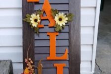 05 an old shutter repurposed into a cool and bright fall sign, a creative and budget-friendly idea