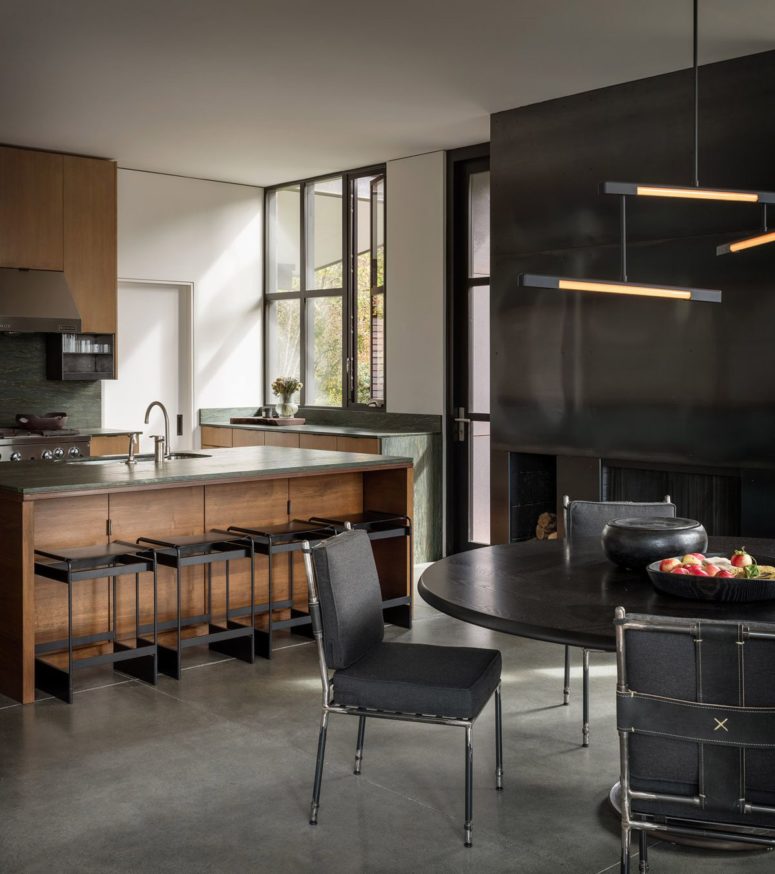 Natural rich stained wood, stone and dark metals are used in such an elegant way that it takes your breath away Natural rich-stained wood, stone and dark metals are used in such an elegant way that it takes your breath away