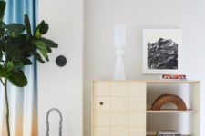 06 Touches of blue, teal and turquoise here and there enliven the interior and make the spaces bolder