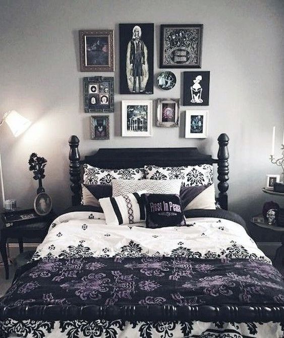 a monochromatic bedroom spruced up with printed pillows, a bold scary gallery wall and some more artworks