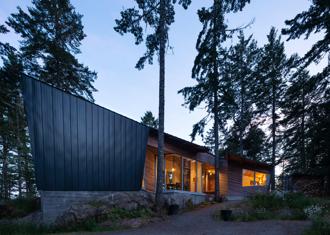 This contemporary geometric home is built in the middle of the forest and features cool views and minimalist interiors