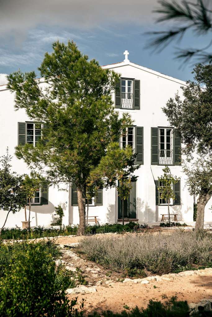 This lovely rural retreat in Menorca, Spain, was built in the 19th century and renovated now