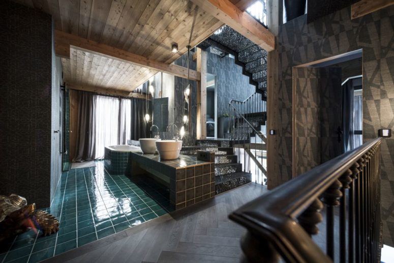 dark moody spaces mixed with warm wood Dark and moody spaces are done in dark and muted colors and green and turquoise are added for a touch of color