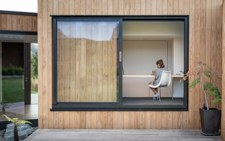 large windows is a must for a mountain retreat Large windows throughout the house bring in natural sunlight and expose the spaces to the panoramic views