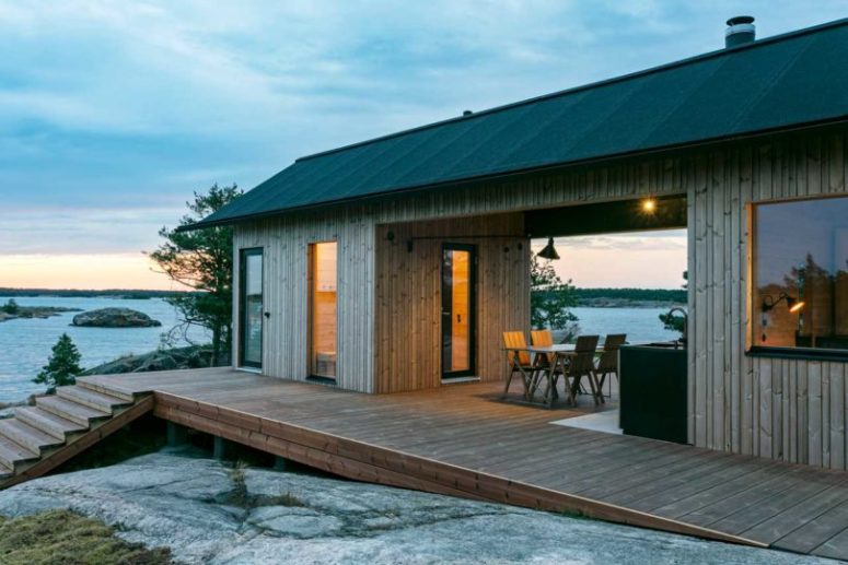 a cabin with an outdoor kitchen There's an outdoor kitchen and terrace under the roof, with gorgeous views and feeling of outdoors