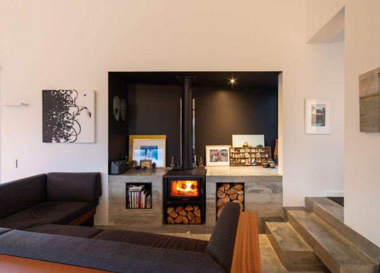 Dark color tones are strategically inserted into the decor in order to create an intimate and comfortable ambiance Dark color tones are strategically inserted into the decor in order to create an intimate and comfortable ambiance