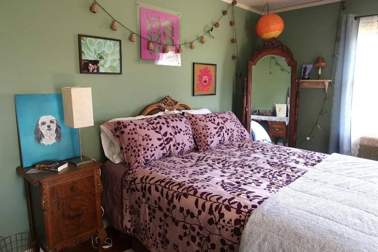 Here's amother bedroom done in green, with elegant and refired carved furniture and bright textiles and art Here's amother bedroom done in green, with elegant and refired carved furniture and bright textiles and art