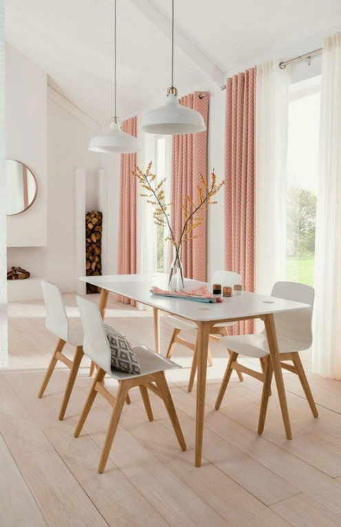 a white dining room made fresher and cooler with peachy pink printed curtains - that's an easy and fast way