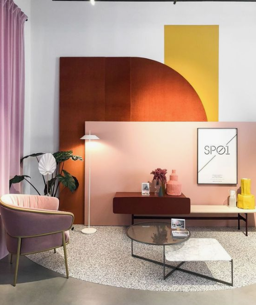 a lovely living room nook done in mustard, rust, pink and blush and accented with touches of gold and black