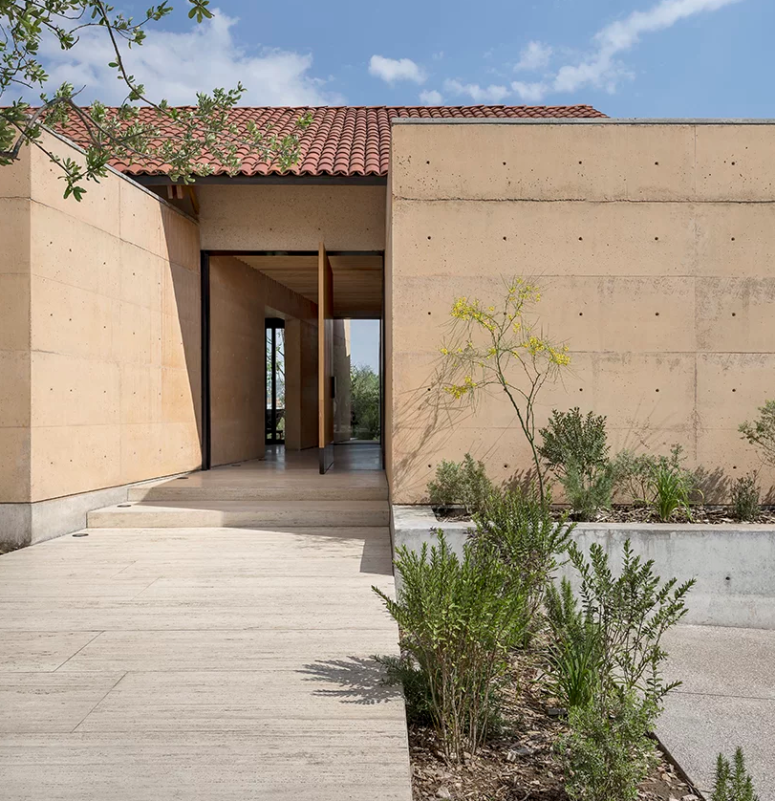 Landscaping was done with flower beds and simple greenery - landscaping fits the exterior of the house