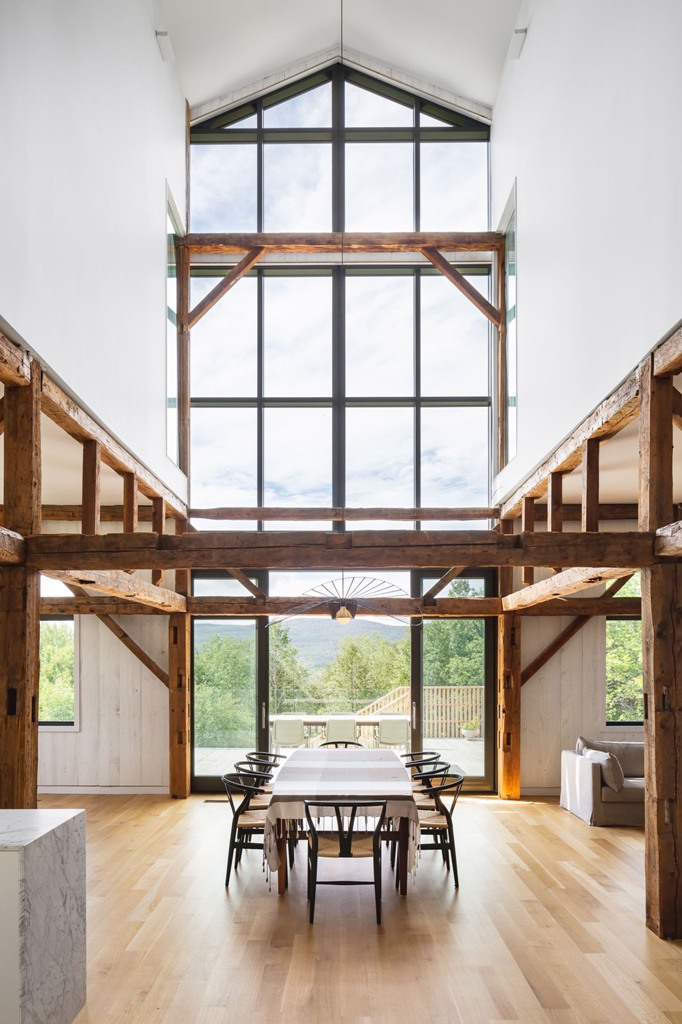 The spaces are opened with glass walls and lots of windows, with wodoen beams and whites help to make the spaces lighter The spaces are opened with glass walls and lots of windows, with wodoen beams and whites help to make the spaces lighter