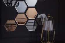 03 an arrangement of silver and copper hexagon mirrors will make any blank wall stand out