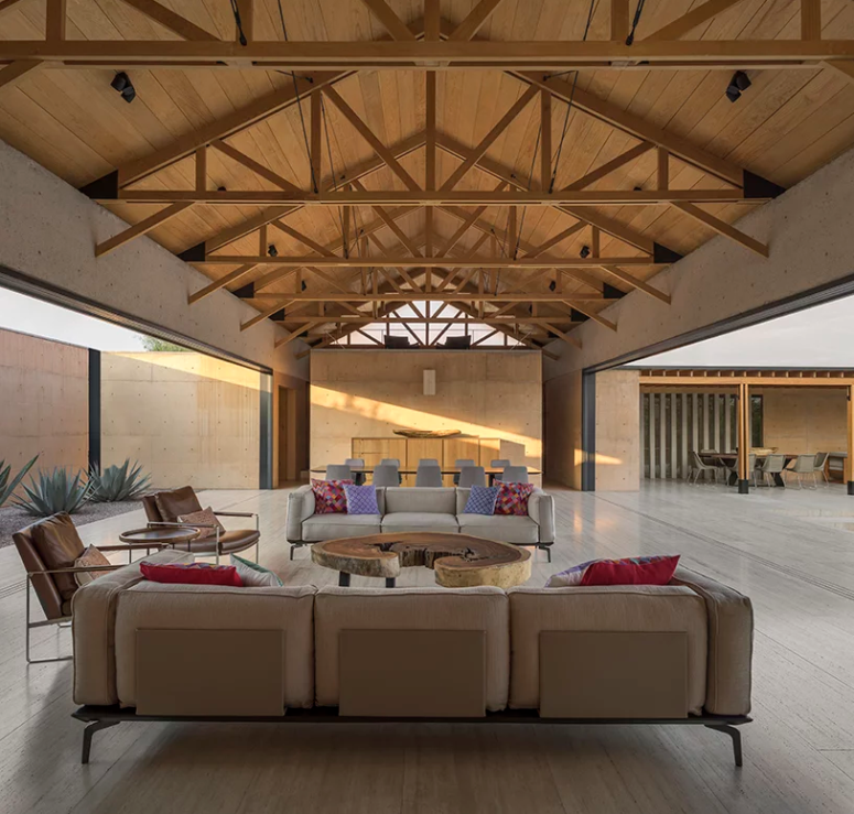 The living space is united with the dining one, there are beams on the ceiling and contemporary furniture with bright touches, sliding doors open the indoor spaces to outdoors The living space is united with the dining one, there are beams on the ceiling and contemporary furniture with bright touches, sliding doors open the indoor spaces to outdoors