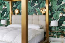 06 a statement thick brass canopy bed looks bold in this tropical bedroom and adds glam and chic to it