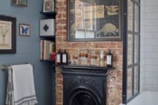 06 a touch of brick in the bathroom with a faux fireplace will instantly give it an industrial and vintage feel