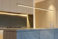 07 a minimalist kitchen with sleek cabinets and lots of built-in lights looks very chic and very edgy