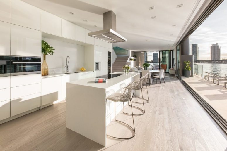 The ground floor lounge area is super bright and stylish, with sliding glass doors leading to the deck The ground floor lounge area is super bright and stylish, with sliding glass doors leading to the deck