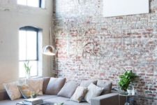 09 a neutral brick wall and factory-like windows make the space feel more industrial and more catchy