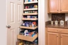 09 a small built-in pantry with pull out shelves is a super functional idea that is a great fir for small spaces – you’ll use every inch