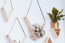 09 creative minimalist shelves with sleek triangular shapes and air plants will be a perfect wall garden