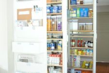 10 a mini built-in pantry with rolling out shelving units – here you can store lots of things easily