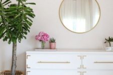 10 an IKEA Songesand dresser hack with gold pulls and corner braces is a timelessly chic piece