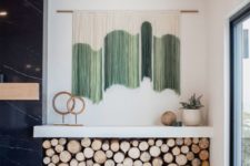 13 a color block green and white fringe wall hanging will add color to your space and can be easily DIYed
