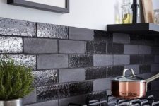 15 a black backsplash done with shiny and matte faux bricks is a cool and fresh modern idea to try