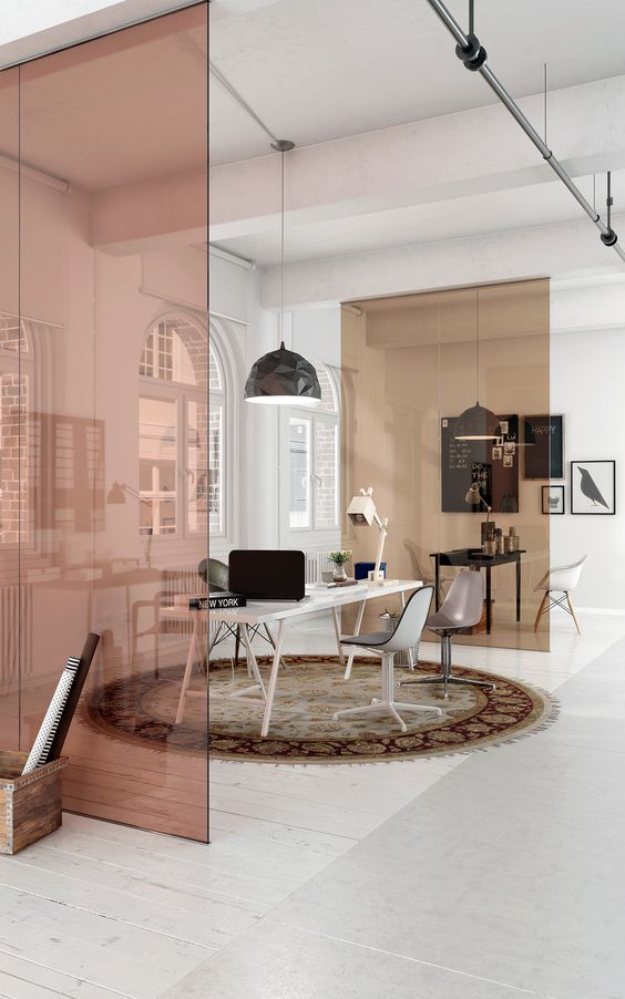 sheer muted color glass partitions are a stylish and contemporary way to divide spaces