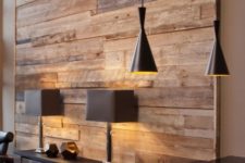 18 a reclaimed wood wall gives this space comfiness, warmth and looks textural and cozy, not too formal