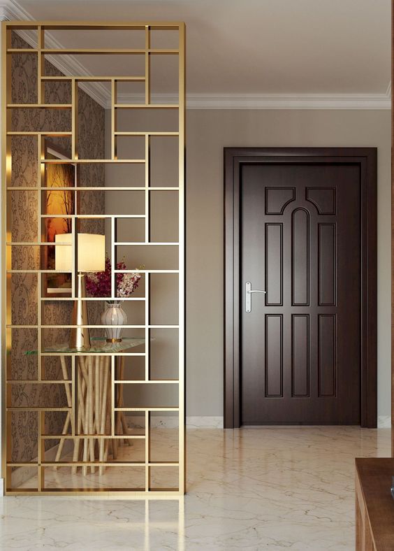a beautiful gilded geometric screen will unobtrusively divide the spaces and is sheer enough for a small home