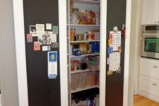 21 a small built-in pantry with sliding chalkboard doors – leave your notes, lists and pics on them