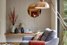 24 mid-century-inspired printed wallpaper wall is a chic and bold idea for a living room