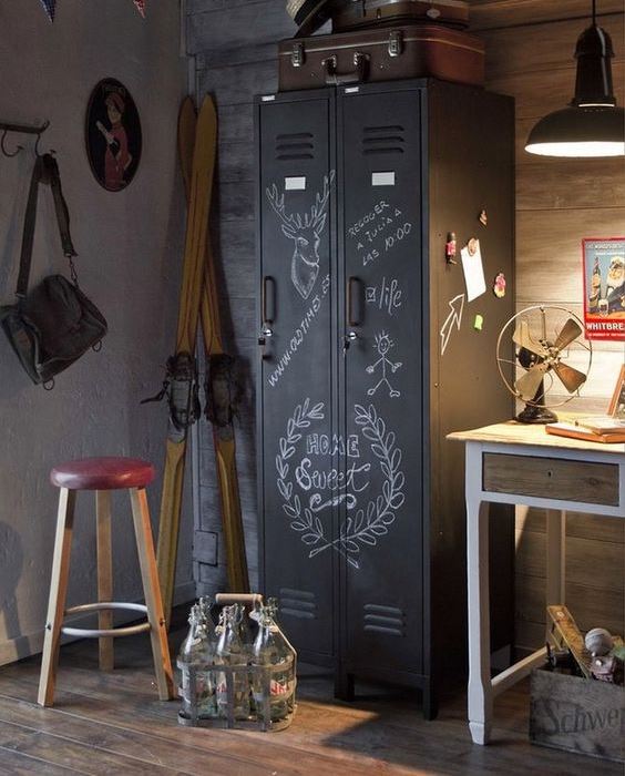 a vintage metal cabinet, on which you can chalk, is a cool idea to add an industrial and vintage touch to the space