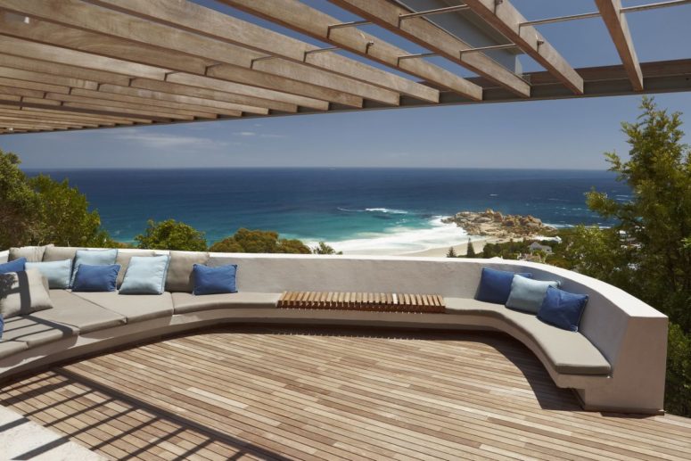 There's a gorgeous contemporary terrace with sea views, a deck and a roof