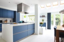 11 a minimalist classic blue kitchen and matching curtains will add color and chic to your space