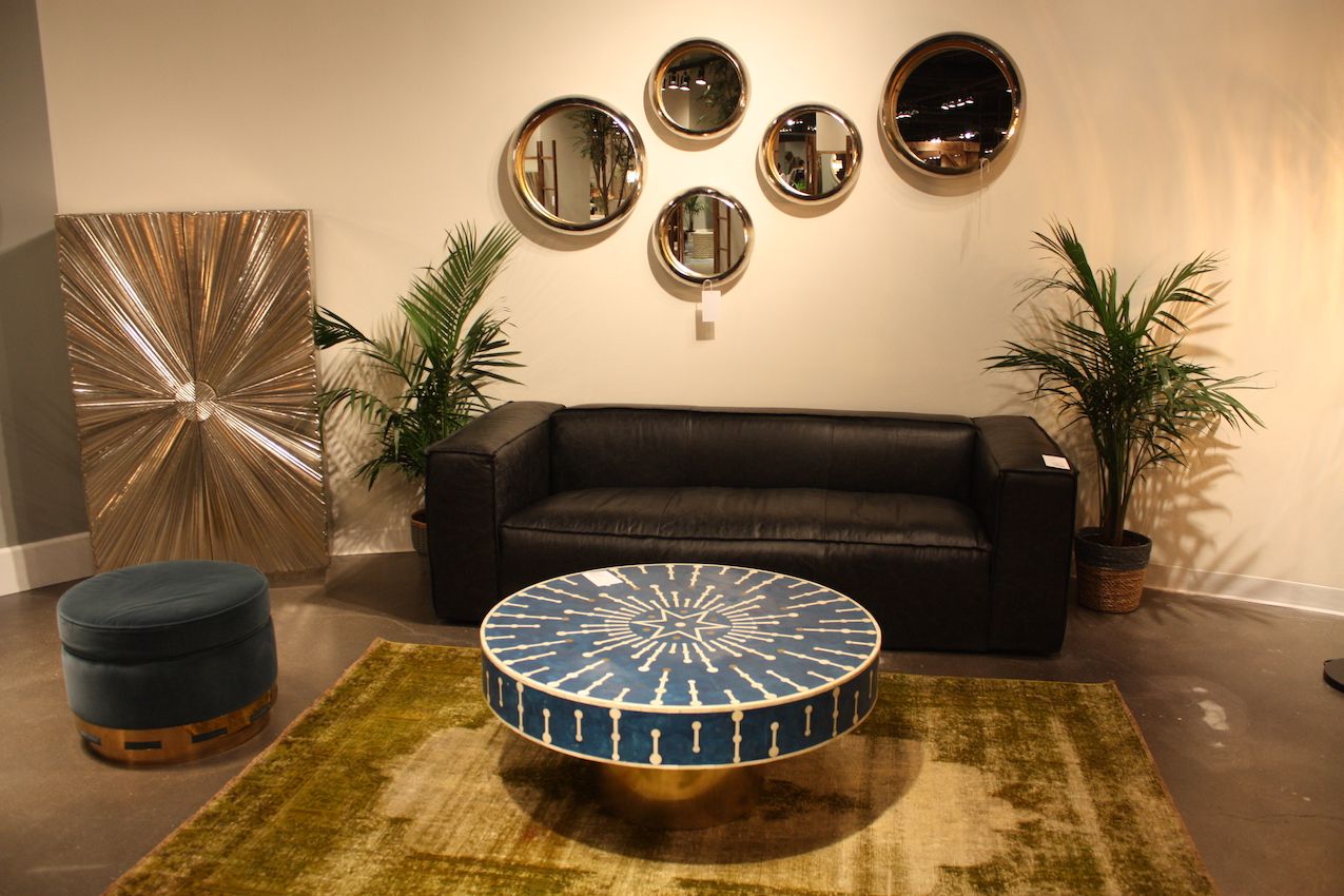 a printed classic blue coffee table and a matching classic blue ottoman for a refined and chic living room