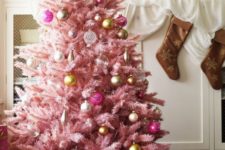 17 a pastel pink Christmas tree with sheer, gold and pink ornaments with a vintage feel looks very sophisticated
