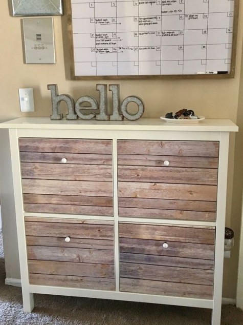 a rustic IKEA Hemnes shoe storage hack with aged wood pieces is a gorgeous idea